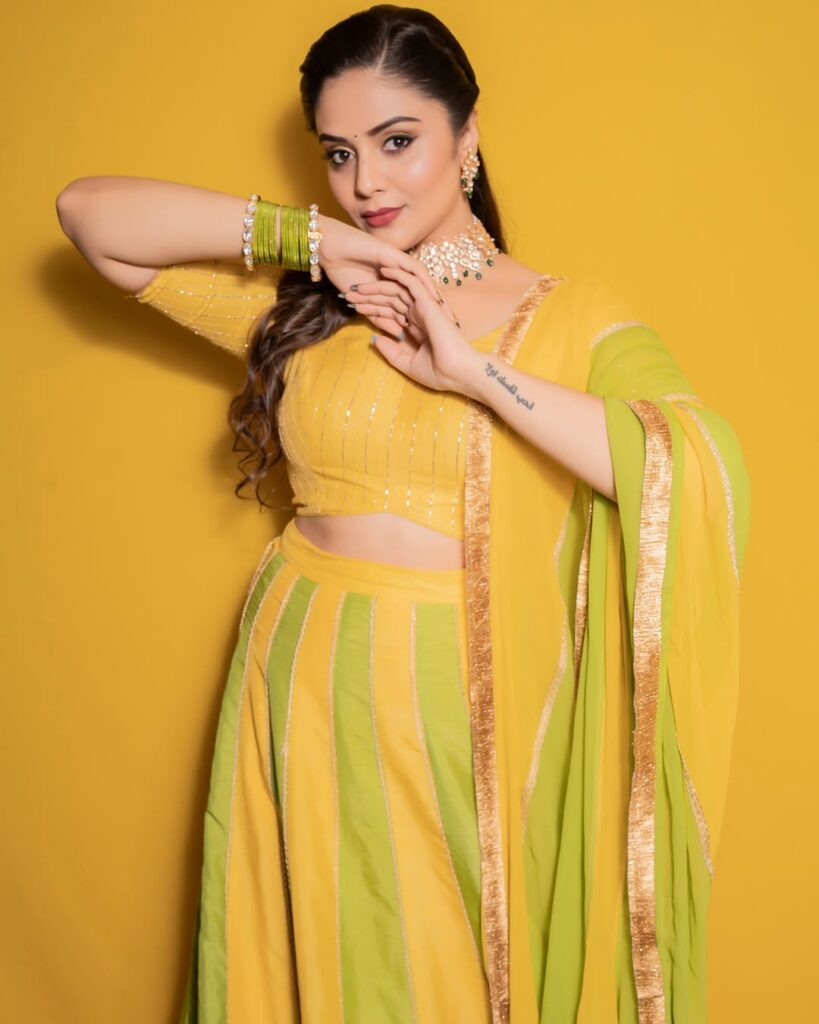 Sreemukhi in a stunning yellow dress