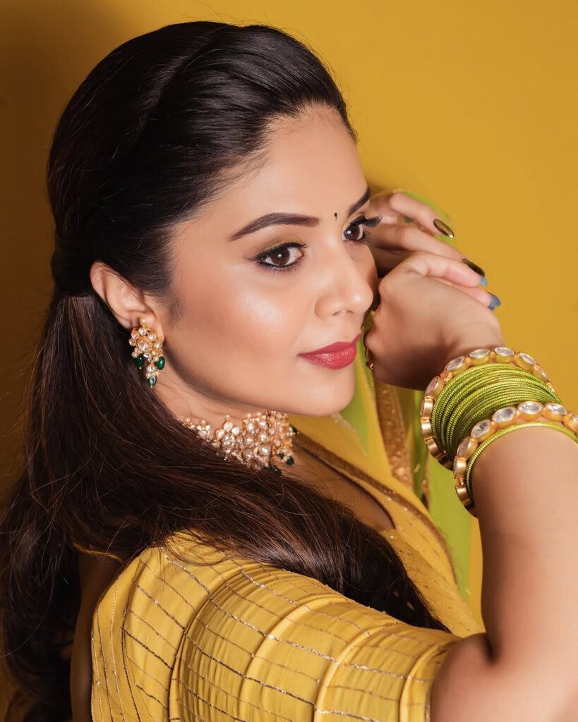 Sreemukhi in a stunning yellow dress