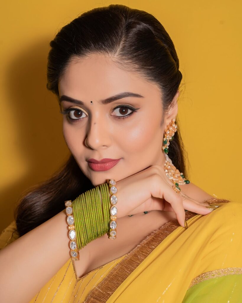 Sreemukhi in a stunning yellow dress