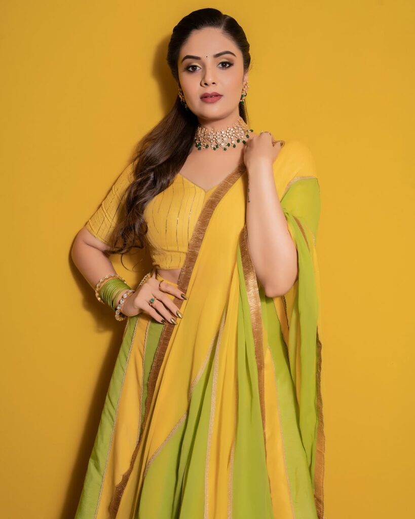 Sreemukhi in a stunning yellow dress