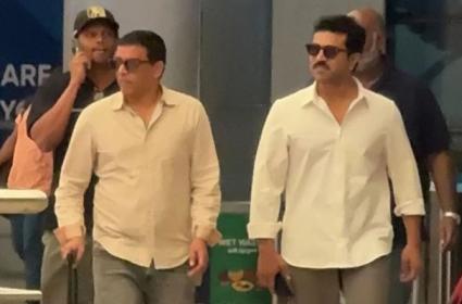  Ram Charan And Dil Raju Spotted At Hyderabad Airport